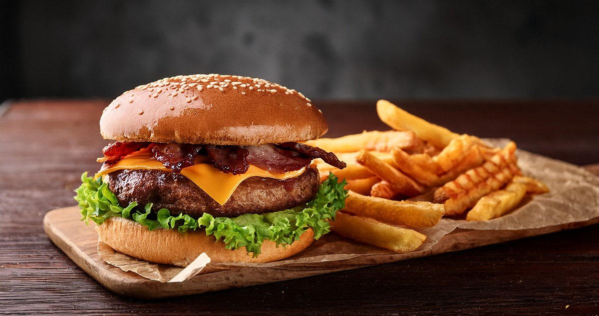 Delicious cheese burger with fries